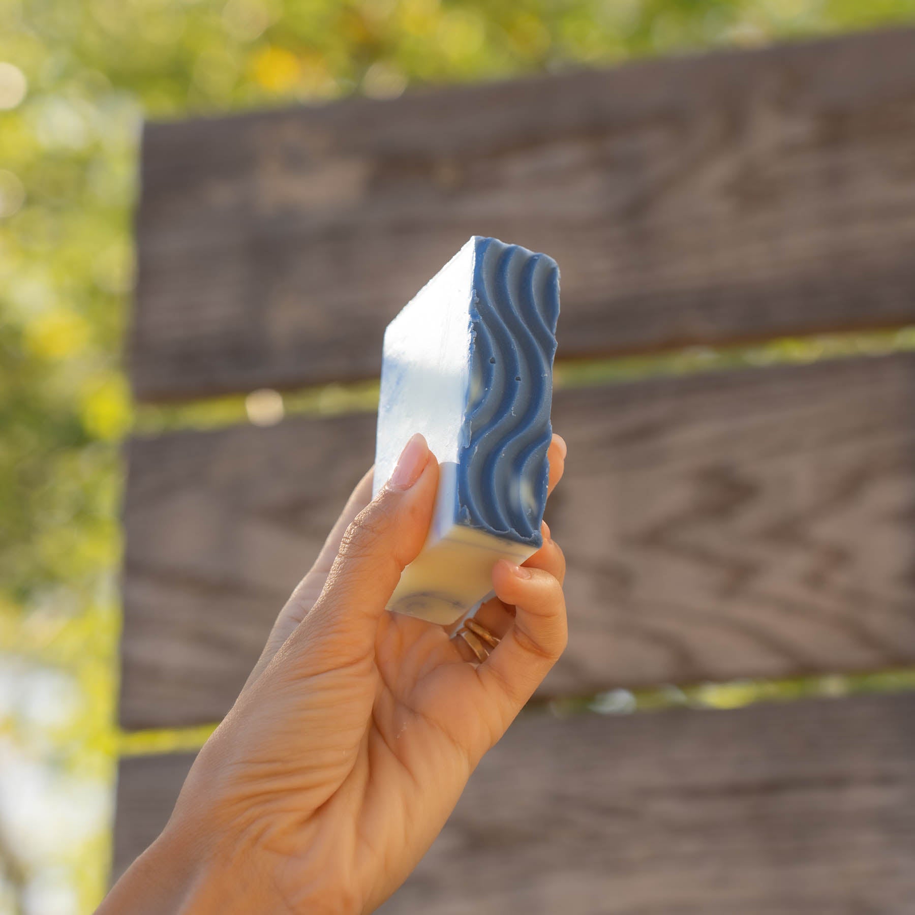 Handheld view of Hydrate + Revive Body Wash – travel size concentrated bar
