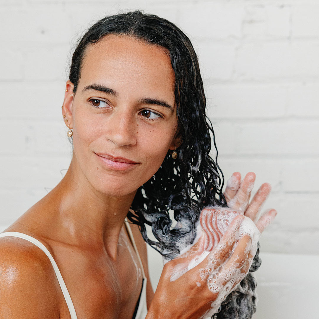 Your Curls Don't Need More Product. They Need Less Buildup.